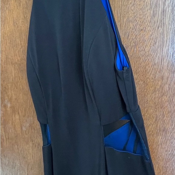 Beautiful black floor length gown with jeweled neckline and cut out sides - Picture 2 of 12